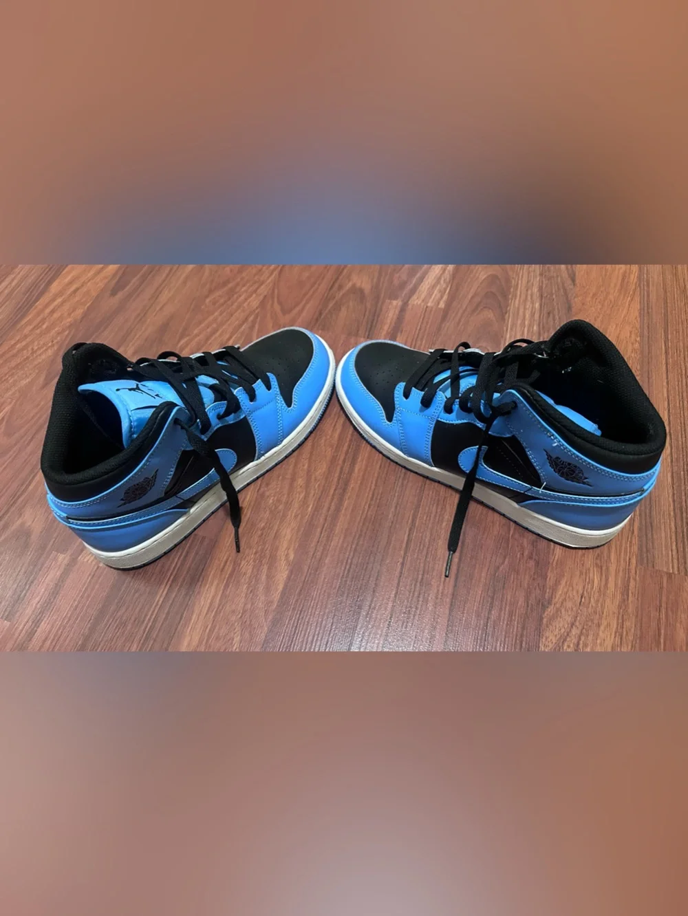 Jordan Youths Light Blue and Black High-Top Sneakers